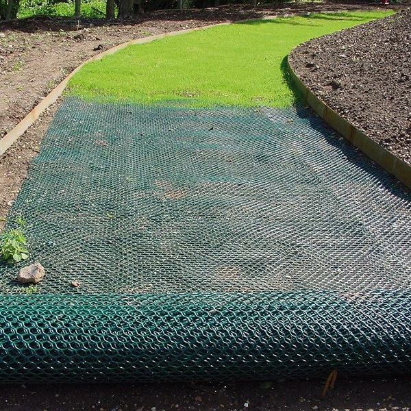 Lawn reinforcement net is laid on the walkways.