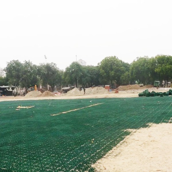 Plastic grass pavers are paved on the park plaza.