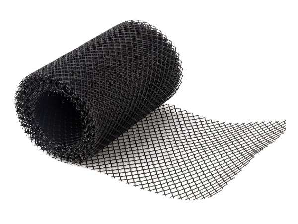 Flat plastic mesh gutter guard on a white background